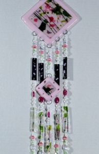 This one is pink with flowers all over it. Sure it's plastic but it's pretty.