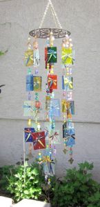 Dragonflies aren't the kind I'd have in mind for wind chimes. But these look great on the squares. Lovely.