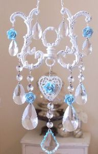 I don't think this is handmade. After all, the metal on this seems fairly manufactured. But I do think it's very beautiful.