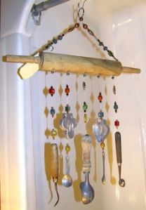 This one consists of a rolling pin and utensil chains. A bit large for any window, don't you think?