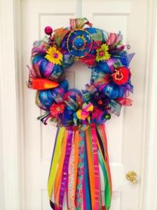 Yes, it's another Cinco de Mayo wreath. I have quite a few of them on this post. But this one has thicker ribbons and a sombrero on top.