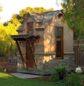 This has wooden frame windows and a small balcony. Love the roof on this, too.