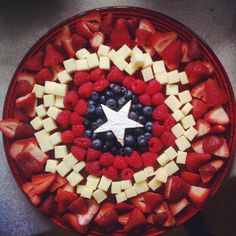 This includes strawberries, cheese, raspberries, and blueberries. Mostly fruit but the colors are consistent with the shield.
