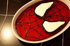 It's just red jello made to resemble Spider Man's head. And yes, icing is involved.