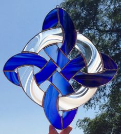 Yes, this is another abstract design. Like the white ring around the blue loops on this.