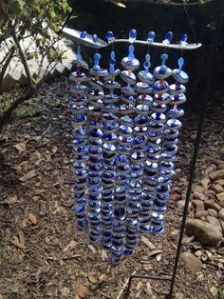 These beads seem to resemble stones. Wonder if this wind chime is meant to represent a waterfall.