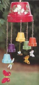 Yes, this is another flower pot wind chime. But this one has some bees and butterflies. So it's different than the other one I showed you.