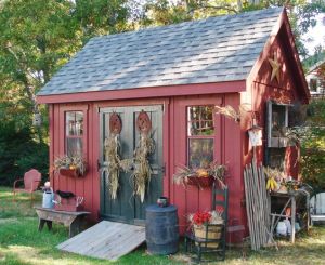 This one seems decorated for fall. But I do like how the roof and the doors stand out.