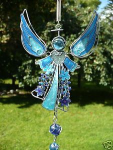 This one uses wire, marbles, and glass for this angel. And the results are wondrous beyond compare.