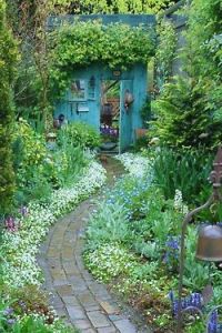 And this one appears to be covered in ivy. Love the garden surrounding it though.