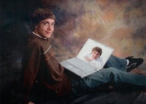 And he has a picture of himself on his laptop screen. What a self-absorbed asshole.