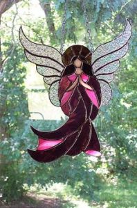 Yes, I know I've been putting a few angel suncatchers up. But trust me, this one is incredibly beautiful.