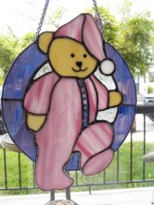 And here is one in their little pajama outfit. Probably used for a kids room. But it's so adorable.