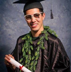 And apparently, this guy's school tends to photograph their graduates with a lei of pot. Or so it looks like it.