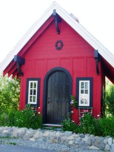 Love how the black trimmings stand out with the red. The white windows look great, too.