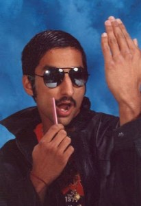 Apparently, the photographer was really pressed for time. So the picture had to be taken. Still, this boy thinks he's hot stuff doesn't he?