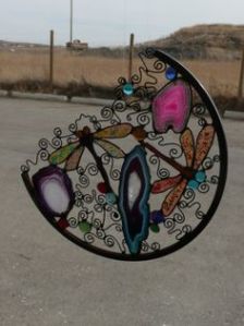 Now this seems to be quite colorful. Love the glass pieces on this thing. So pretty.