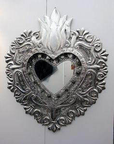 Well, this is supposed to be a Mexican rendition of the Sacred Heart of Jesus. Looks cool though, especially with the silver flames.