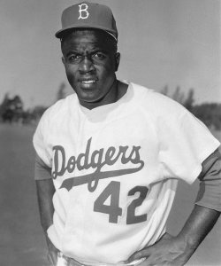 As the first African American man to play a major league sport in the modern era, Jackie Robinson challenged the traditional basis of racial segregation through his exceptional talent, his use of nonviolence, and his dignified character. His 10 year career with the Brooklyn Dodgers and off the field activities greatly contributed to the Civil Rights Movement.