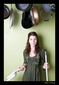 However, she's had to do some dusting below the pots and pans. And I'm not sure if she's able to reach any of them.