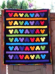 Sure it has Mickey Mouse ears on it. But at least it's in a nice rainbow pattern that I can put on this post.