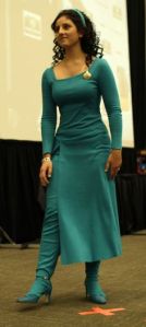 Well, that blue dress is lovely. However, as far as the TNG cast is concerned, she's not among the most liked.
