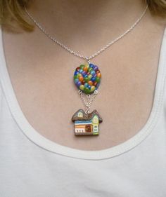 This one is a pendant of the house from Up with balloons. Yes, it's fine craftsmanship but very delicate.