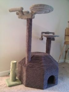 Not sure if there are any feline fans of Star Trek. But this does have a scratch post of the Enterprise and a Klingon ship.