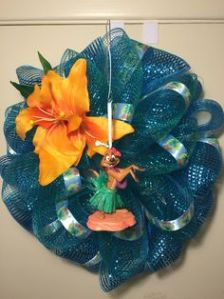 Yes, this blue deco mesh wreath features Timon when he and Pumbaa put on a song and dance routine to distract the hyenas. It's in the movie, by the way.