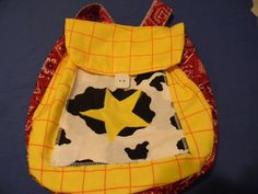 This is a Woody backpack from Toy Story. Has bandanna stripes and a star.