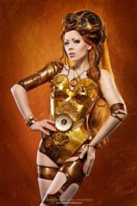 Not sure if it makes her a steampunk C-3PO. But she does have a clock on her chest to tell the time of day.