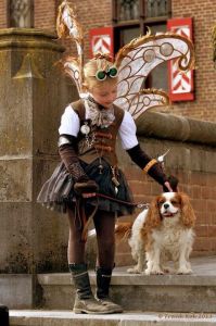 Yes, this is a little girl steampunk fairy and her dog. And yes, I think you'll find it heartwarming and touching.