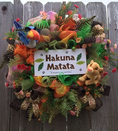 Don't know why this wreath doesn't include Timon and Pumbaa. Because "Hakuna Matata" is their song.