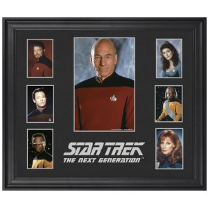 From The Robot's Pajamas: "Above is a series of photos of the TNG cast that look like they belong in a high school yearbook. I’m surprised Worf’s background isn’t a bunch of neon lasers. It’s not the most exciting series of images. And they charged $100 for it. That’s just adding insult to injury."