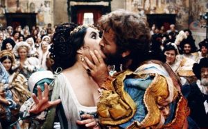 Petruchio: "You lie, in faith; for you are call'd plain Kate,/And bonny Kate, and sometimes Kate the curst;/But Kate, the prettiest Kate in Christendom,/Kate of Kate Hall, my super-dainty Kate,/For dainties are all cates: and therefore, Kate,/Take this of me, Kate of my consolation;- /Hearing thy mildness prais'd in every town,/Thy virtues spoke of, and thy beauty sounded,/(Yet not so deeply as to thee belongs,) —/Myself am mov'd to woo thee for my wife." - Act II, Scene 1