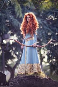 Well, here she is in a finer dress and with her red hair in a blazing glory. Very pretty but you don't want to mess with her.