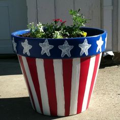 Has a blue row with stripes on the top. And columns of red and white stripes on the bottom.