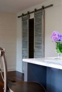 Or giant shutters if you look at it differently. But it goes well with the room.