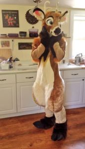 Wonder what this deer did in the kitchen that makes him so embarrassed? Anyway, I'm sure any broken utensils can be replaced for a buck or two.