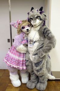 Not sure what the animal on the right is supposed to be. But the girl dog with glasses doesn't look too bad.