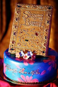 Not sure if you can eat the book. But it sure makes this cake stand out to some extent.