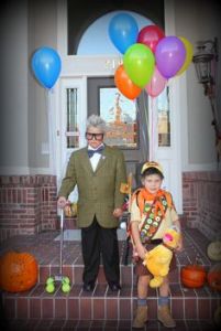 These are kids dressed as Carl and Russell. I guess Carl's costume was fairly easy. And Russell has a plushie of Dug.