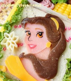 And this seems to be a good likeness of her. Wonder what the hair is made of.