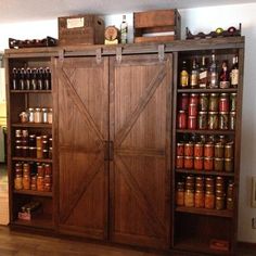 Seems like this is where all the preserves are in the pantry area. Not sure what's behind those doors, though.