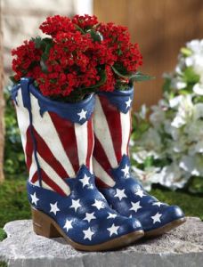 Well, the flowers certainly go with the boot design. But don't try to wear them. Really, it's not a good idea.