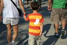 This kid is dressed up as a monster who arrives at the factory with a sock on his back. He's later shaved and has to wear a cone. Let's just say it makes scaring rather inconvenient.