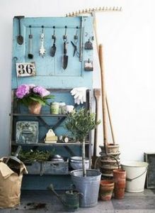 Well, you can hold your garden tools on the hooks and the plants on the shelves. Not sure where you put the rake or pots.