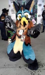 Guess this is a case of a mix and match critter holding a couple powerful weapons. Of course, they're props but still. Don't know what this is.