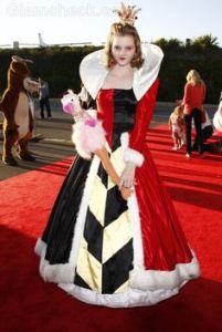 And here she is with a flamingo as a croquet mallet. Don't piss her off. Really, if you value your life, just don't.