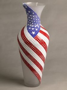 Well, that's a grand old design on a vase. Wouldn't want to put that in a high place with a small ledge. Hate to see something like that broken.